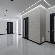 stylish white hall in big apartment building