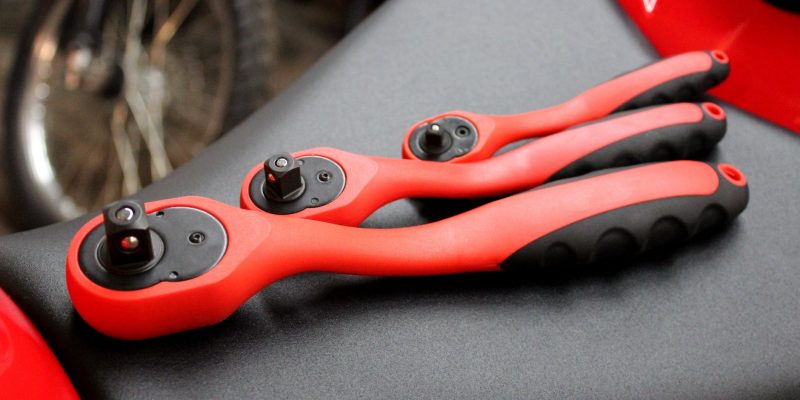 black and red socket wrench